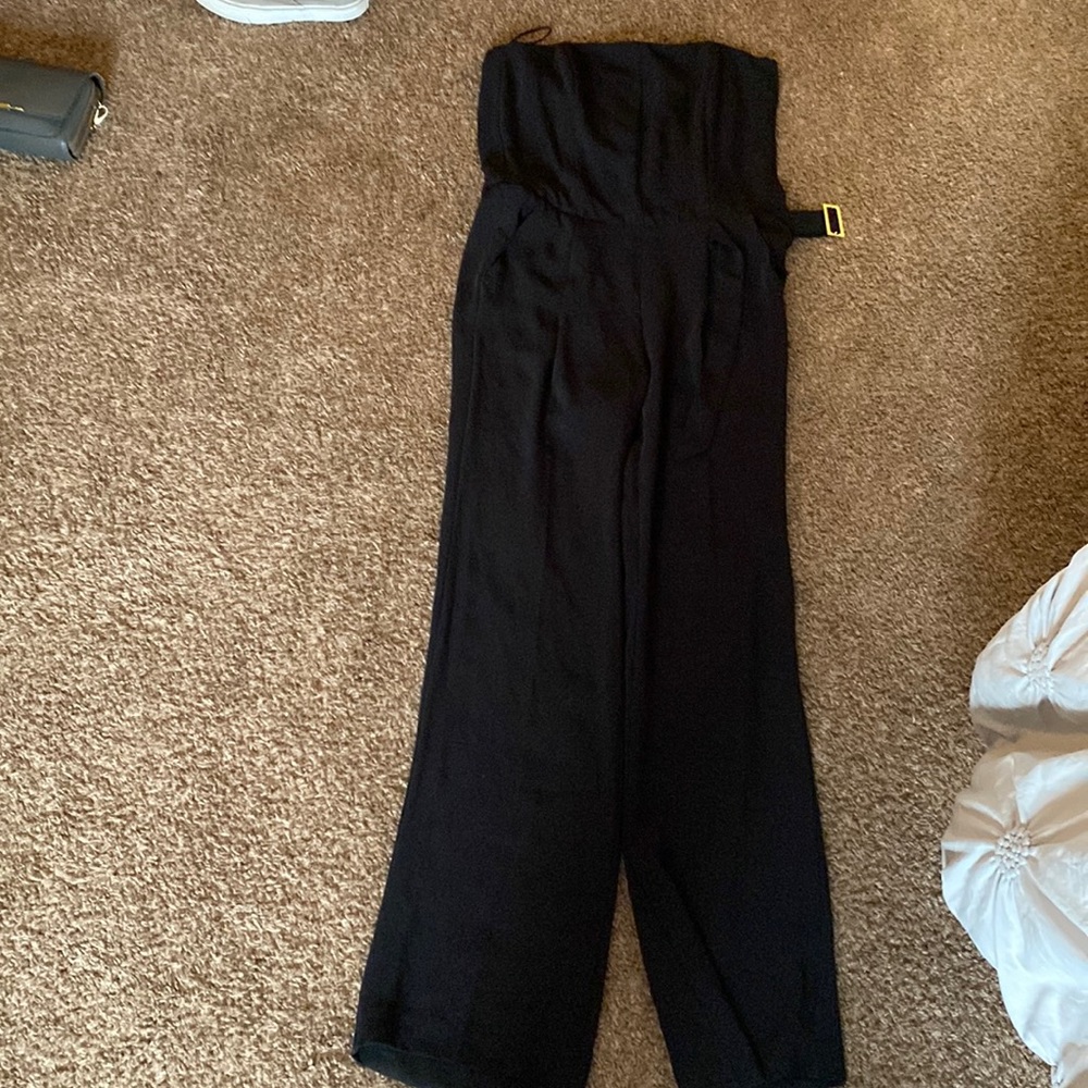 Black sleeveless jumpsuit